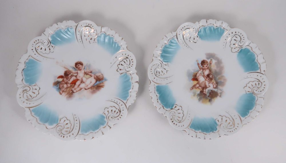 Par de pratos porcelana moldada XIX/XX - Anjos